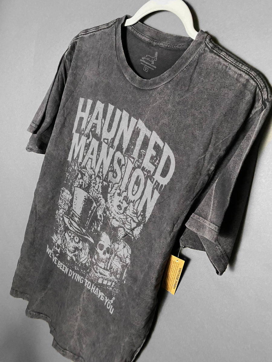 We designed this one of a kind tee Haunted Mansion tee only available at Park Hop Tees. This is made with the hatbox ghost, and madame leotta. We've been dying to have you